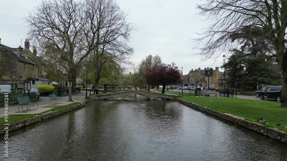 Low Drone River Windrush bridge Bourton on the Water Cotswold village UK Low Drone River Windrush bridge Bourton on the Water Cotswold village UK