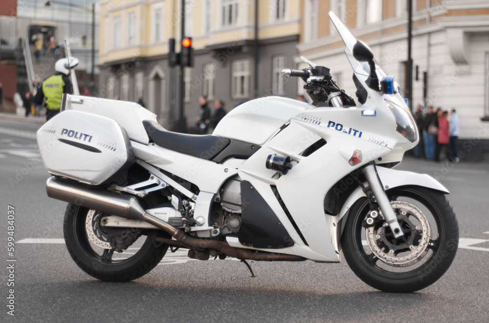 Police, motorcycle and transportation vehicle in city, safety and law enforcement on urban road, empty street and Norway. Security, motorbike and travel for public service, legal power and authority