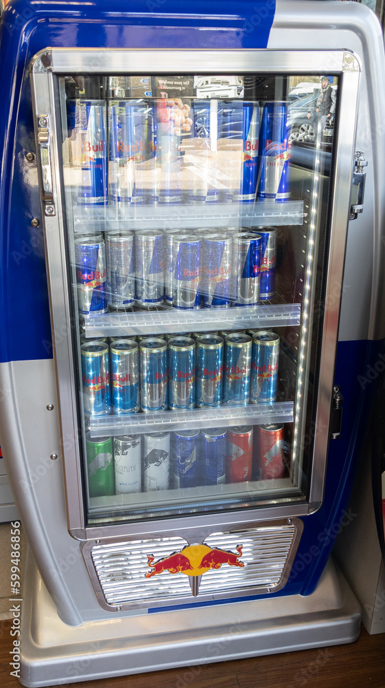 Red Bull display fridge advertising can in store market RedBull Energy  Drink Stock Photo | Adobe Stock