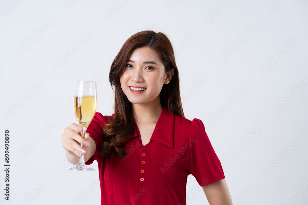 Portrait of a beautiful, charming lady wearing a red dress on a white background Portrait of a beautiful, charming lady wearing a red dress on a white background