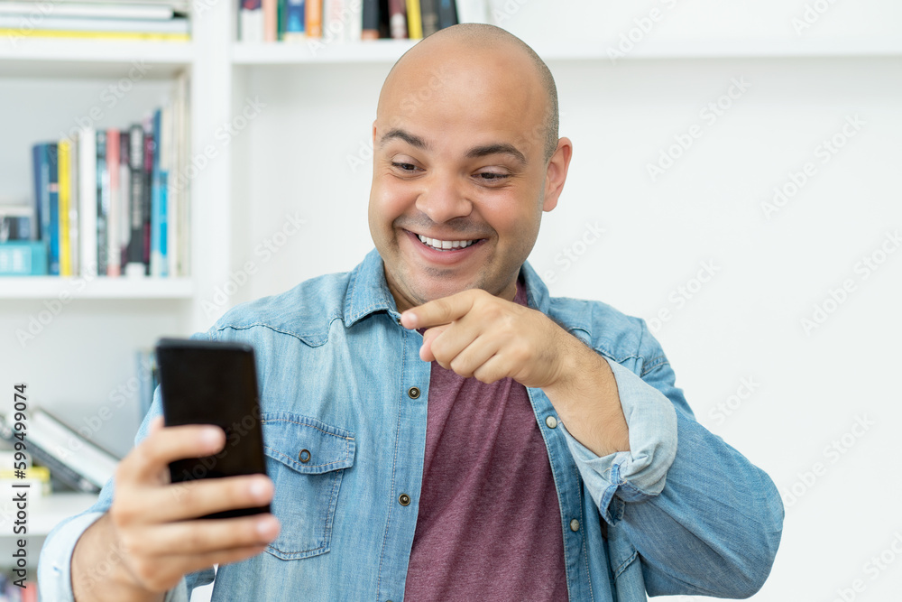 Video call of laughing man with bald Video call of laughing man with bald