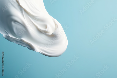 Isolated white body lotion cream on blue background