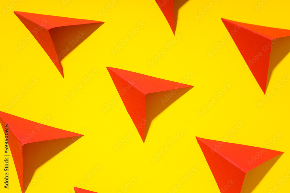Business, startup and sponsorship concept with paper planes on yellow background Business, startup and sponsorship concept with paper planes on yellow background