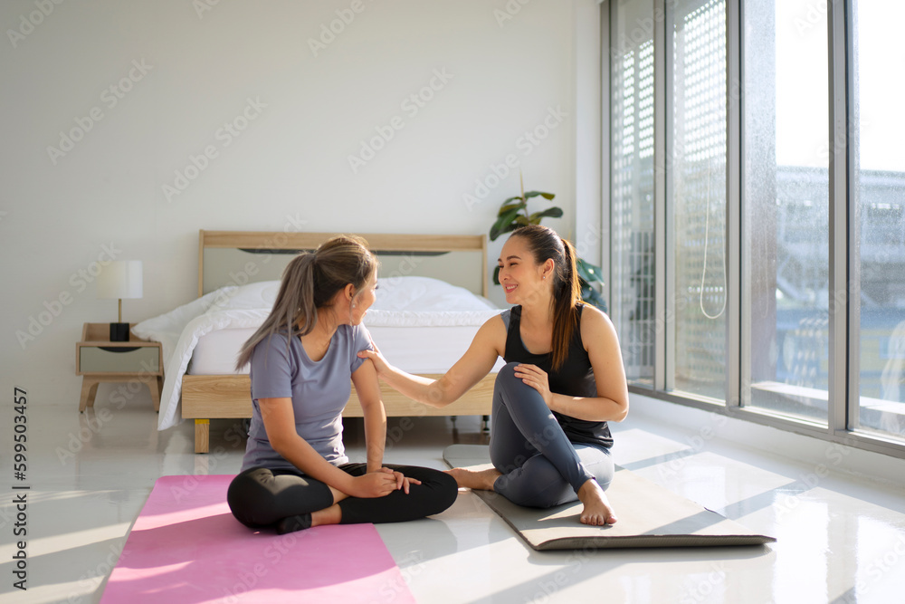 Obraz premium Women play yoga at home.