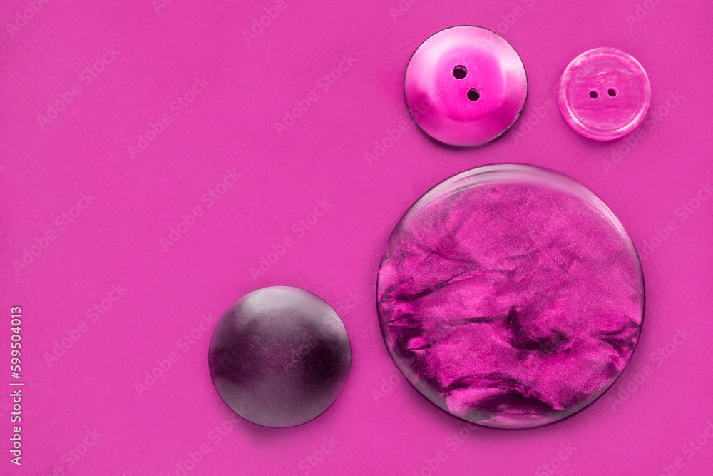 Buttons on fuchsia background