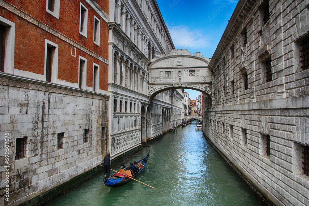 The Bridge of Sighs seen from Ponte della Canonica, Gondola under the Bridge of Sighs, Gondolier along a Canal in Venice