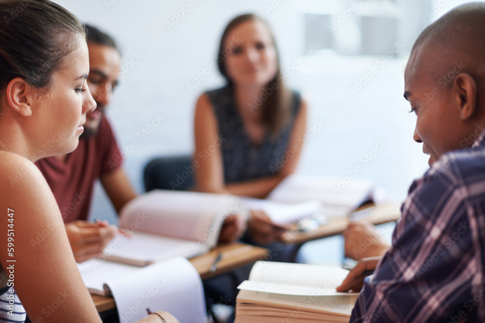 Brainstorming an assignment. a group of university students studying together. Brainstorming an assignment. a group of university students studying together.
