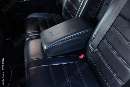 Armrest in the car for passenger and  driver. Car armrest. Car armrest opened. Opened armrest in the car for driver. © Best Auto Photo