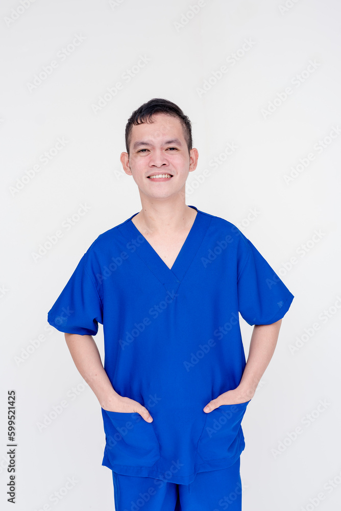 Portrait of a young and skilled medical student, nurse, intern posing with both hands inside pockets. Isolated on a white background. Portrait of a young and skilled medical student, nurse, intern posing with both hands inside pockets. Isolated on a white background.