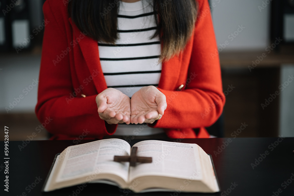 Closeup of simple wooden Christian cross on Bible. Concept of hope, faith, christianity, religion. Closeup of simple wooden Christian cross on Bible. Concept of hope, faith, christianity, religion.