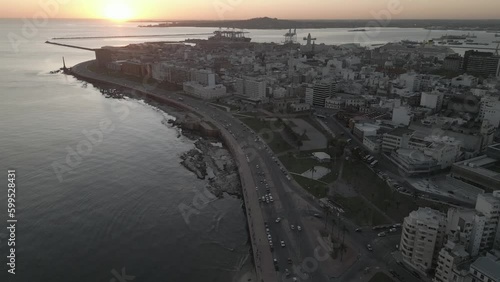 Wallpaper Mural Montevideo Aerial skyline cityscape at sunset with traffic road on coastline Torontodigital.ca