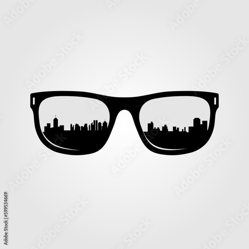 City skyline silhouette reflected in the sunglasses. Vector illustration