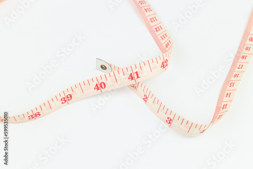 Measuring tape isolated on white background. Clipping path included.