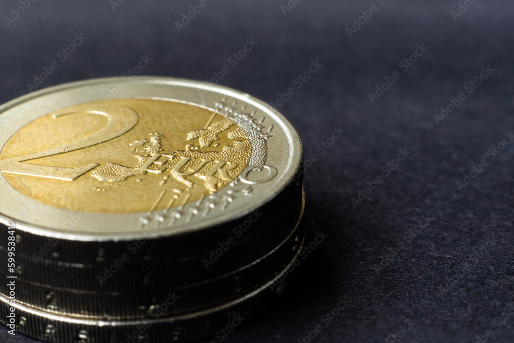Euro close up photo. Macro coins. Soft focus, dark background Euro close up photo. Macro coins. Soft focus, dark background