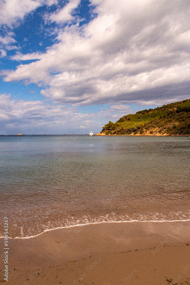 View from Magazzini Beach, a free mixed shingle and sand beach situated in the gulf of Portoferraio, Elba island, Italy View from Magazzini Beach, a free mixed shingle and sand beach situated in the gulf of Portoferraio, Elba island, Italy