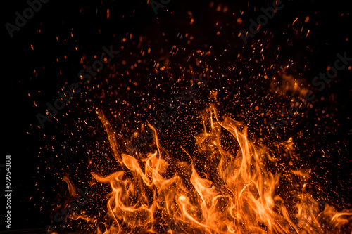Fiery sparks on black: Details of blazing flames isolated on a dark background. created with Generative AI