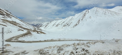 snow covered mountains / snow fall photo