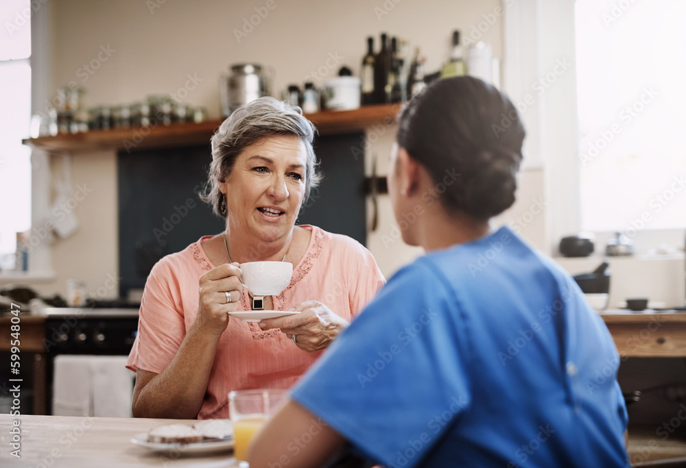 Its so nice to have someone to talk to. a young female caregiver chatting to a senior patient in a nursing home. Its so nice to have someone to talk to. a young female caregiver chatting to a senior patient in a nursing home.
