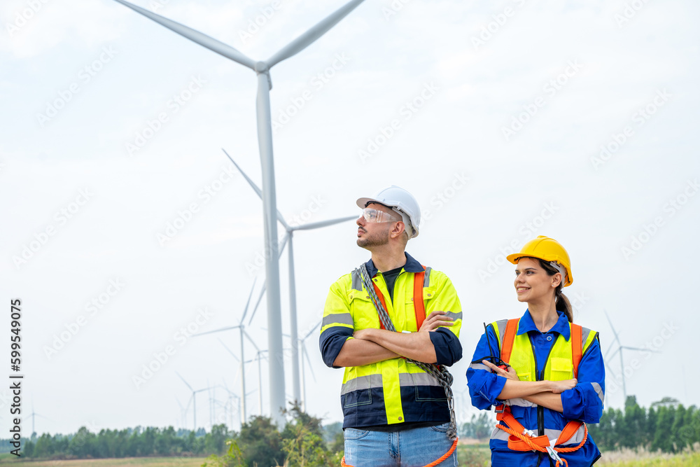Engineers checking wind turbines,Renewable energy technology and sustainability,Alternative energy for future. Engineers checking wind turbines,Renewable energy technology and sustainability,Alternative energy for future.