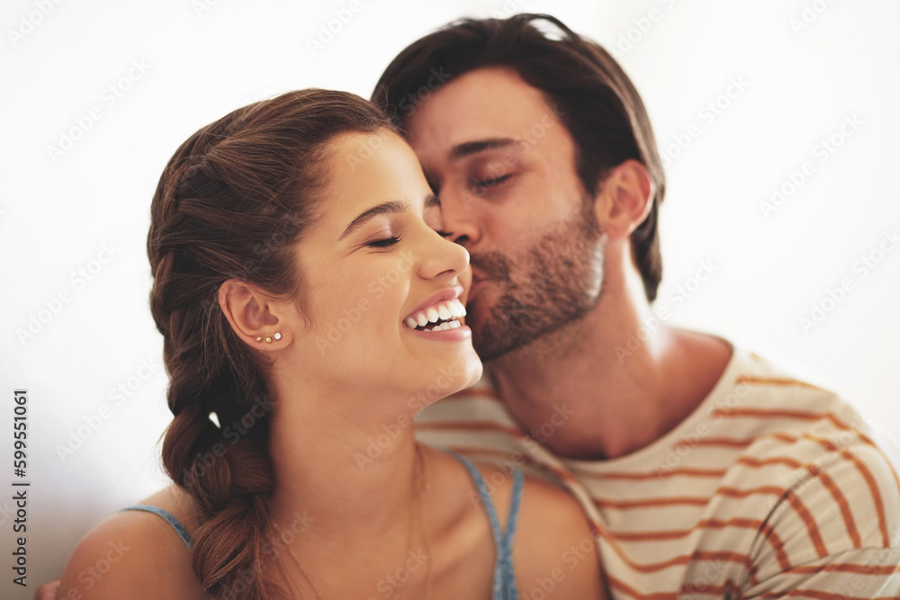 Ill never get tired of loving you. an affectionate young couple bonding at home. Ill never get tired of loving you. an affectionate young couple bonding at home.