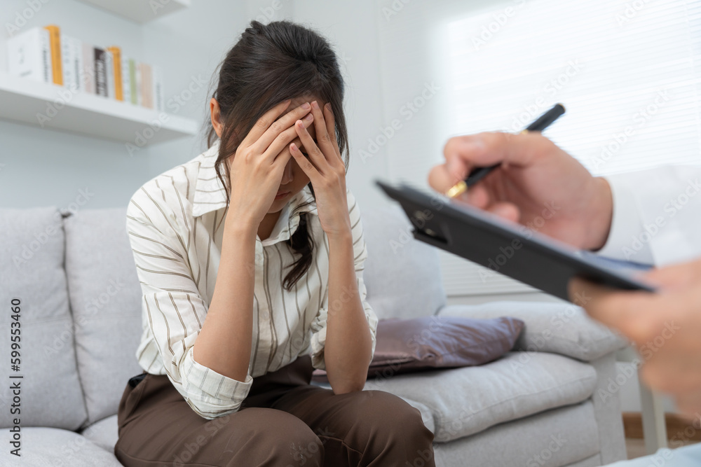 woman with mental health problems is consulting. psychiatrist is recording the patient's condition for treatment. encouragement, love and family problem, bipolar , depression patient, protect suicide woman with mental health problems is consulting. psychiatrist is recording the patient's condition for treatment. encouragement, love and family problem, bipolar , depression patient, protect suicide