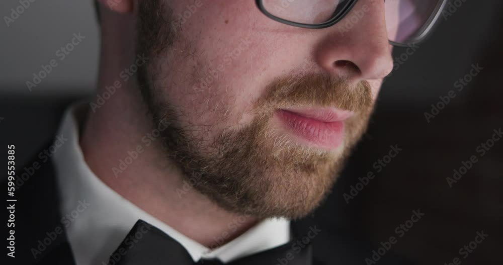 Wedding Groom side shot in slow motion of his mustache and beard with glasses Wedding Groom side shot in slow motion of his mustache and beard with glasses