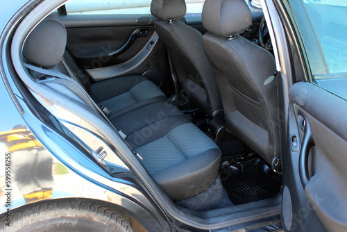 Wallpaper Mural Comfortable rear seats inside the car, retro interior design, rear passenger seats. Close-up rear seats with velours fabric upholstery in the interior. Torontodigital.ca