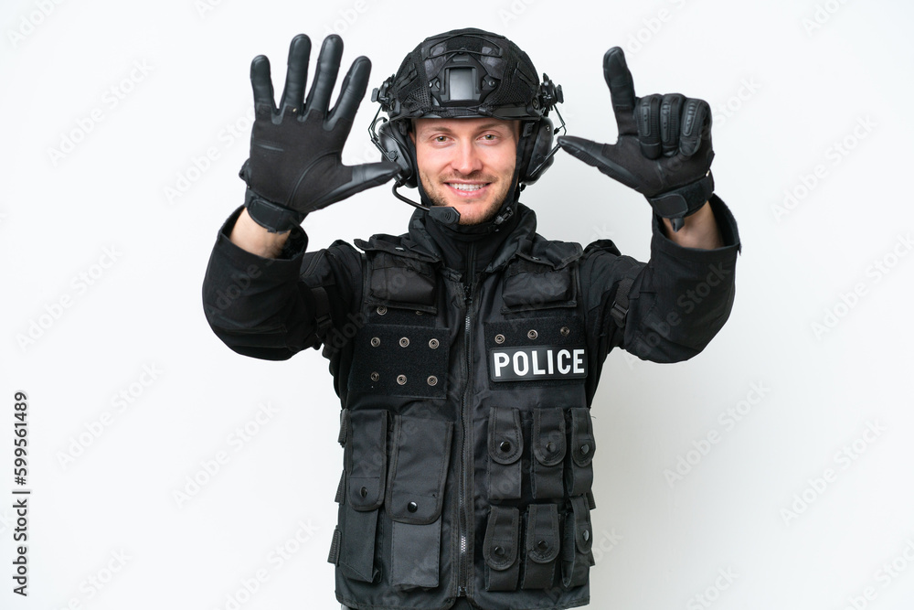 SWAT man over isolated white background counting seven with fingers SWAT man over isolated white background counting seven with fingers