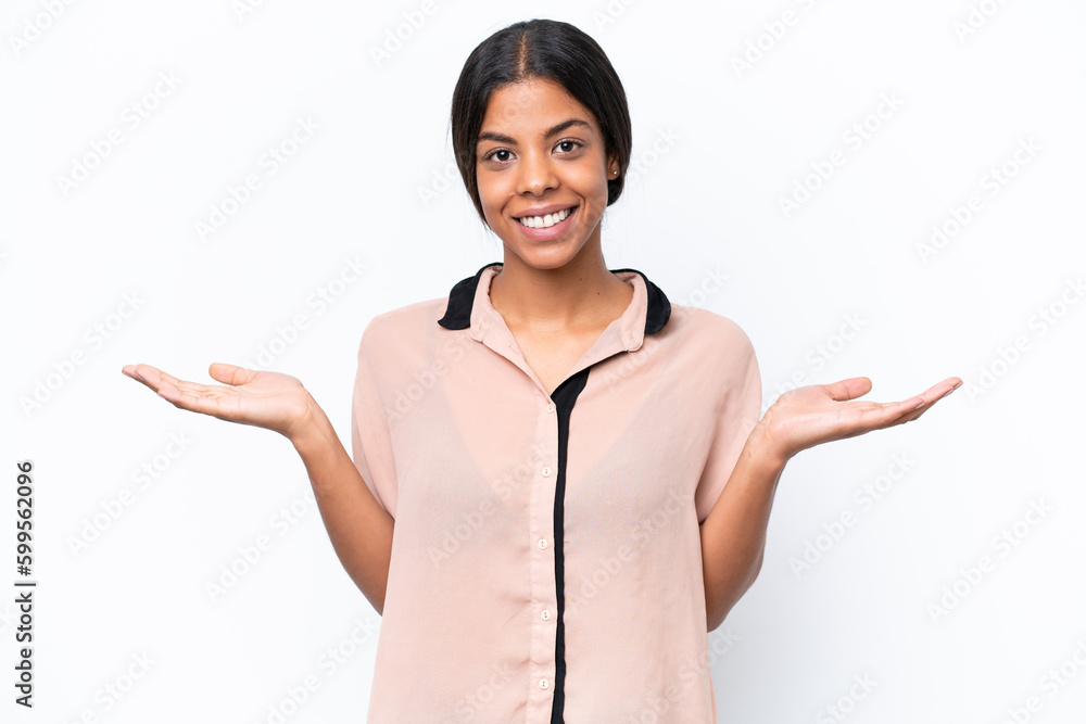 Young African american woman isolated on white background with shocked facial expression Young African american woman isolated on white background with shocked facial expression