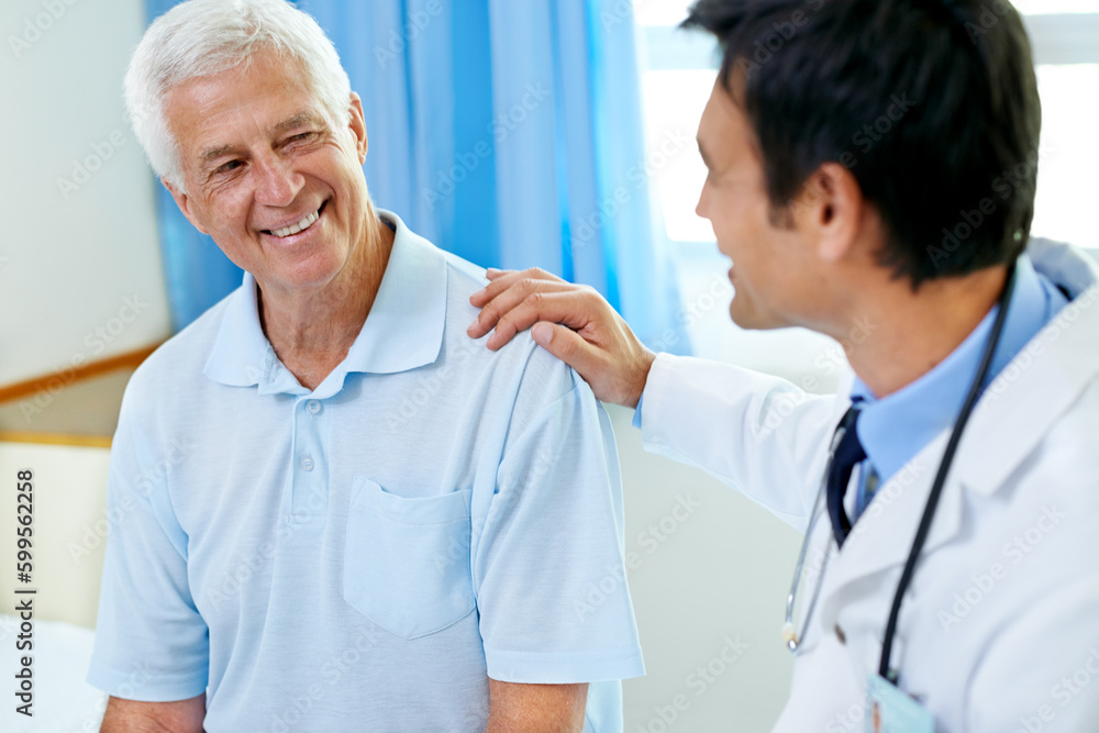 Doctor, senior man patient and discussion with smile, medical clearance and news for healthy in clinic. Men, happy medic and consultation for wellness, healthcare and talking in hospital for helping Doctor, senior man patient and discussion with smile, medical clearance and news for healthy in clinic. Men, happy medic and consultation for wellness, healthcare and talking in hospital for helping