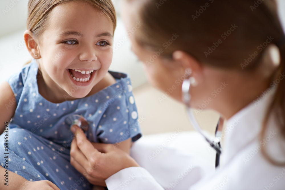 Happy child, girl and stethoscope of doctor for medical consulting, healthy lungs and listening to heartbeat. Face of laughing kid, pediatrician and chest assessment for healthcare analysis in clinic - obrazy, fototapety, plakaty 