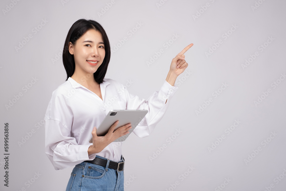 Portrait smile confident asian business woman holding digital tablet on white background Portrait smile confident asian business woman holding digital tablet on white background