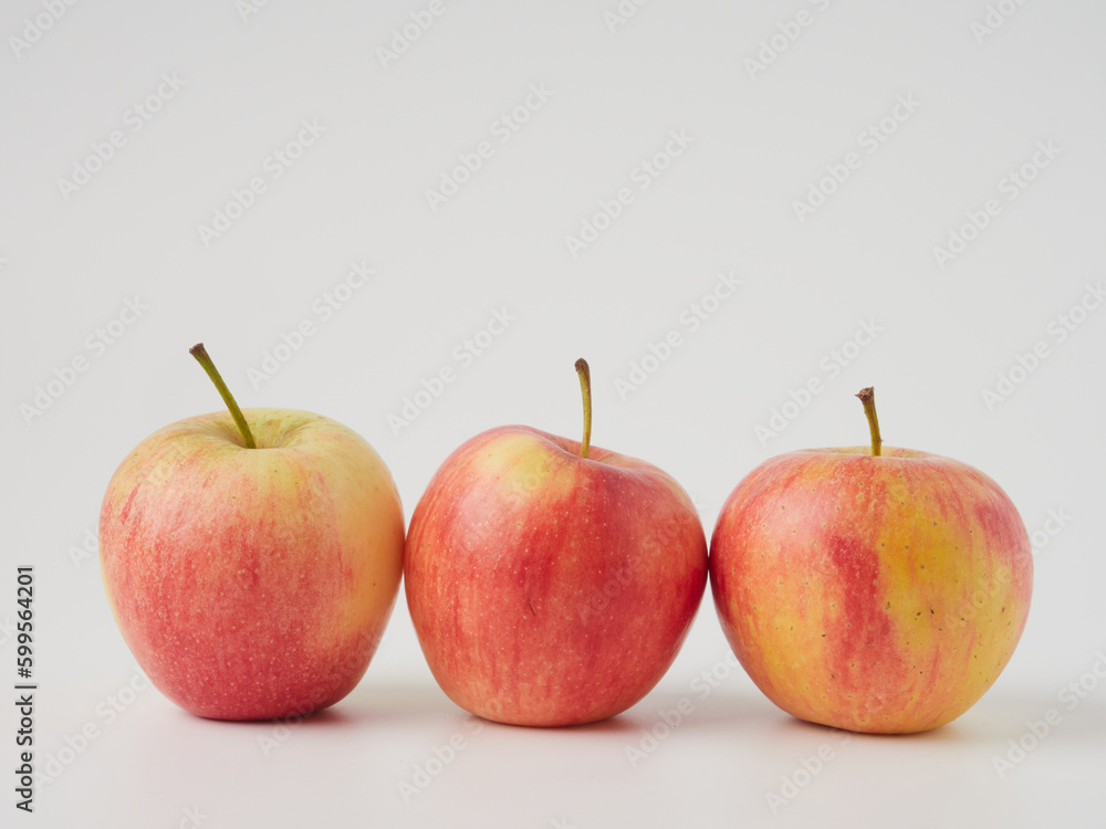 A red apple isolated on a white background with a cropped outline and full depth of field A red apple isolated on a white background with a cropped outline and full depth of field