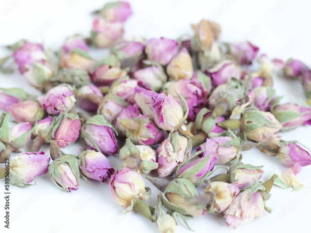 Dried french rosebuds isolated on white background