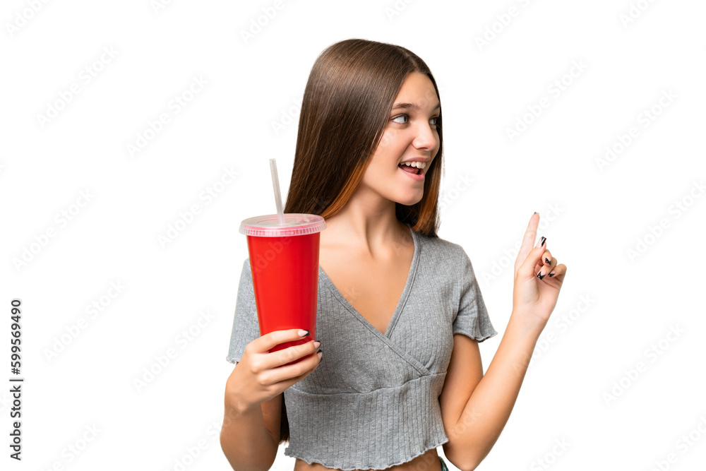 Teenager caucasian girl holding a soda over isolated background intending to realizes the solution while lifting a finger up Teenager caucasian girl holding a soda over isolated background intending to realizes the solution while lifting a finger up