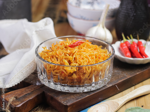 Kentang mustofa, sambal kering kentang or Indonesian cruncy, sweet and spicy potato sticks. It is a side dishes for Opor Ayam (Chicken Curry) and Ketupat or Rice cakes.