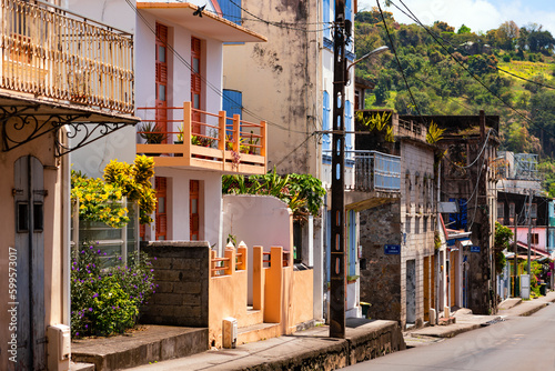 Fototapeta Naklejka Na Ścianę i Meble -  Saint Pierre is major tourist destination and colorful town in Martinique, France. After the volcanic catastrophe with explosion of Mount Pelée in 1902 the village was built up on the ruined houses.