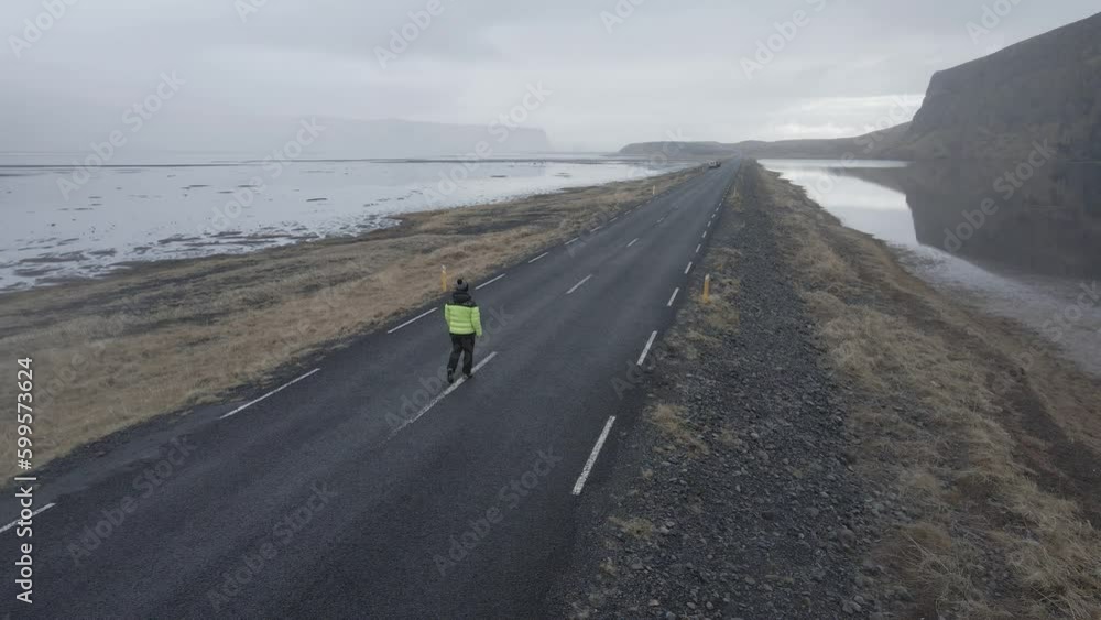 Road in the Vik area, Reynisdrangar in the background Road in the Vik area, Reynisdrangar in the background