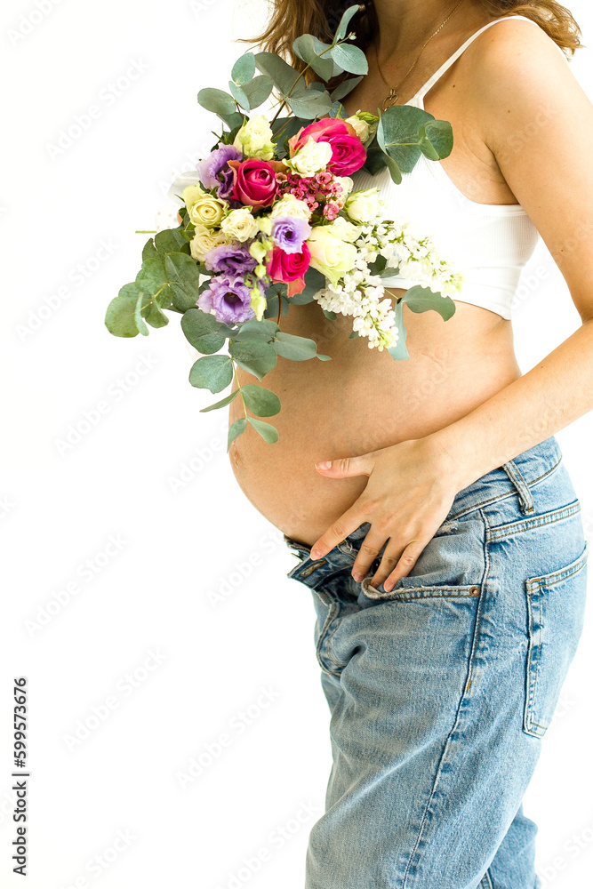 pregnant woman with flowers on a white background