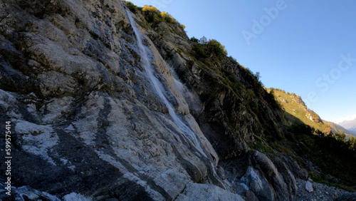 beautiful mountain ridge high land fast water cascade at summertime day - photo of nature