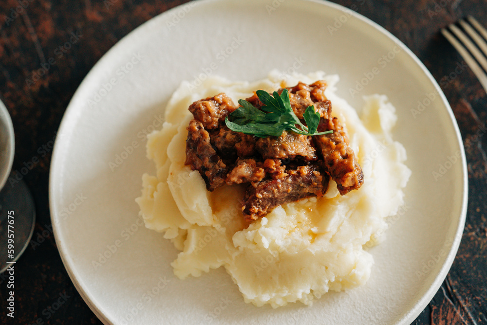 Tasty mashed potato with beef stroganoff hot dishes in lifestyle rustic style beautiful food image Tasty mashed potato with beef stroganoff hot dishes in lifestyle rustic style beautiful food image