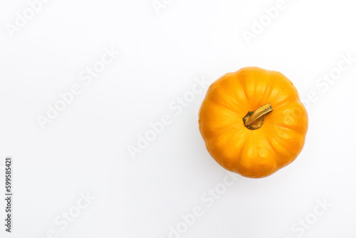 Top view of fresh orange pumpkin isolated on white background with copy space. Created with Generative AI Technology
