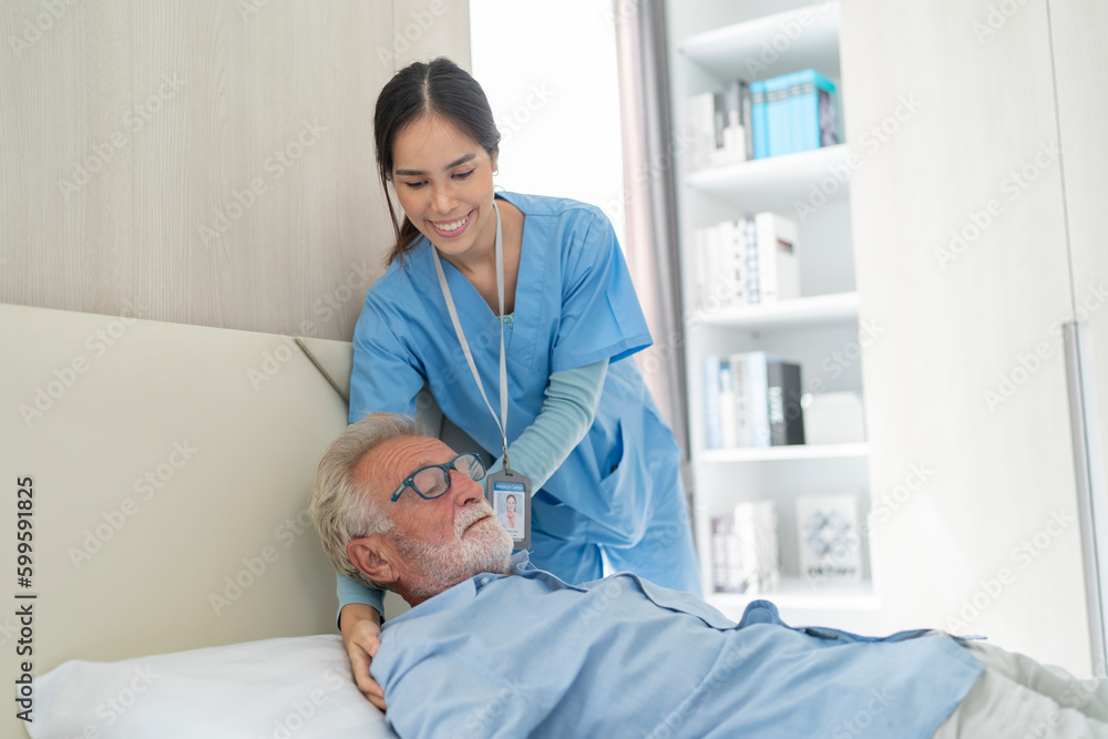 Female home care nurse supports and assists senior man with all he daily needs Female home care nurse supports and assists senior man with all he daily needs