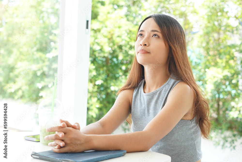 Happy businesswoman working at coffee cafe Successfully complete the planned work without stress. Happy businesswoman working at coffee cafe Successfully complete the planned work without stress.