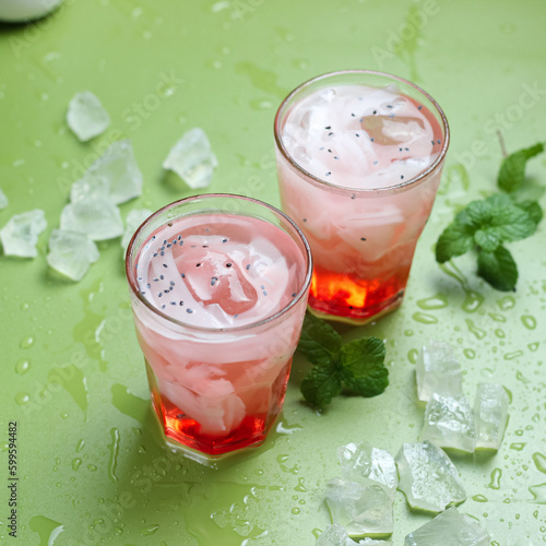 Es Kopyor Jelly or Jelly Syrup Ice which is jelly with the taste of milk or coconut milk which is shaped like a young coconut. Mixed with red syrup, basil seeds, ice cubes. Fresh drinks during Ramadan