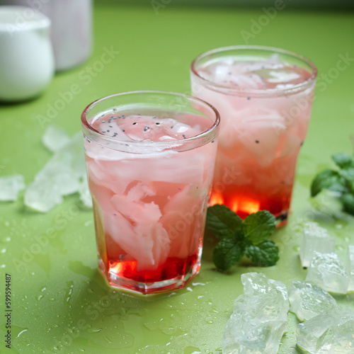 Es Kopyor Jelly or Jelly Syrup Ice which is jelly with the taste of milk or coconut milk which is shaped like a young coconut. Mixed with red syrup, basil seeds, ice cubes. Fresh drinks during Ramadan