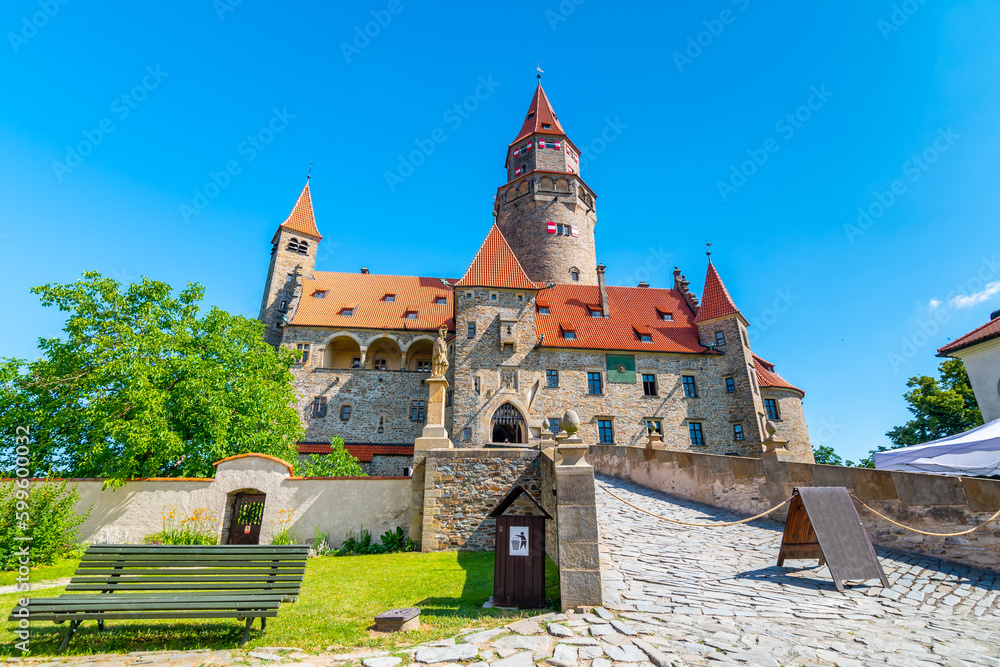 Famous medieval castle Bouzov, Czech Republic. National landmark built in 14 century. Famous tourist destination. Summer weather, blue sky.