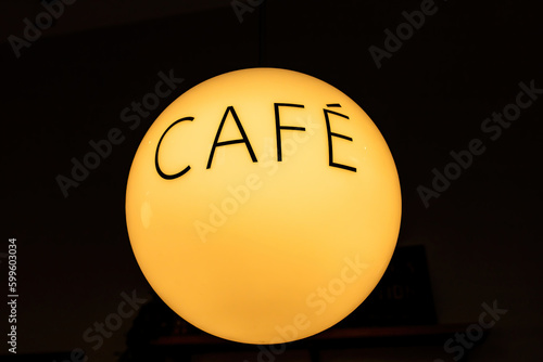 Stockholm, SwedenA sign for a cafe written on lampshade. photo