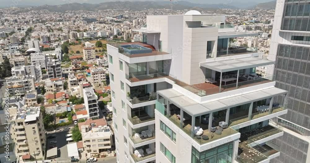 Aerial view apartments on the roof top in a high-rise modern building. Urban landscape. High quality 4k footage Aerial view apartments on the roof top in a high-rise modern building. Urban landscape. High quality 4k footage