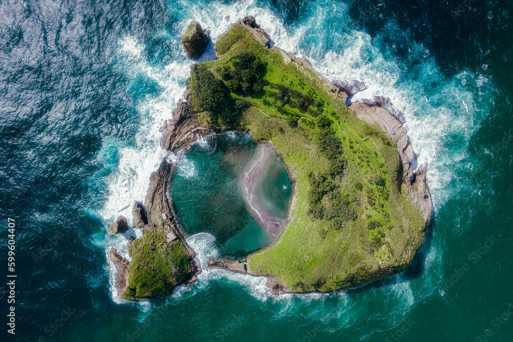 Obraz premium Azores aerial view. Top view of the Island of Vila Franca do Campo. Crater of an old underwater volcano on San Miguel island, Azores, Portugal.